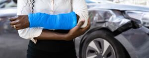 Sustained a fractured arm following a car accident, emphasizing the injury and the process of filing an insurance claim. 