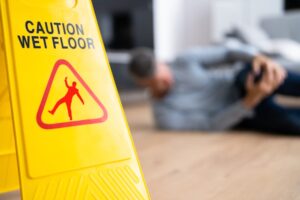 Slip and Fall Accident at Walmart: Caution and Safety with Floor Sign.
