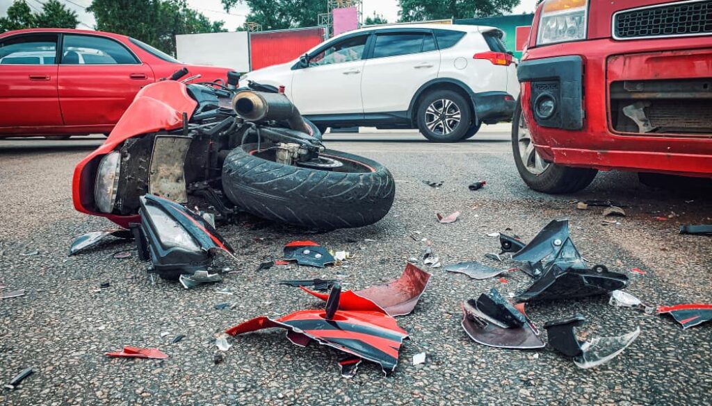 Motorcycle Accident Scene with Vehicle Damage