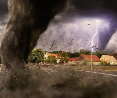 Tornado tearing through Oklahoma neighborhood under stormy skies