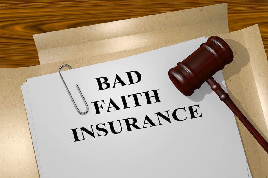 Bad faith insurance concept with legal gavel on a desk